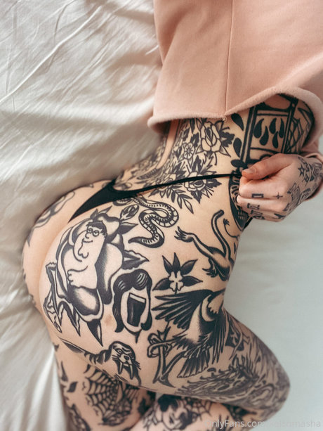 Tattooed Russian nude pornstar photo