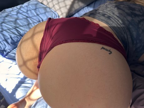 Peachy Caity naked pornstar photo