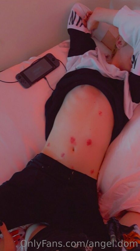 angel dom model adult photo