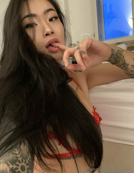 asianiina adult actress photo