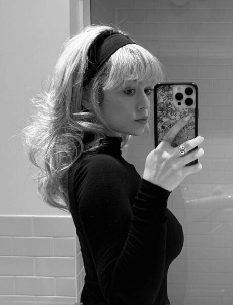 busty redhead onlyfans erotic photo