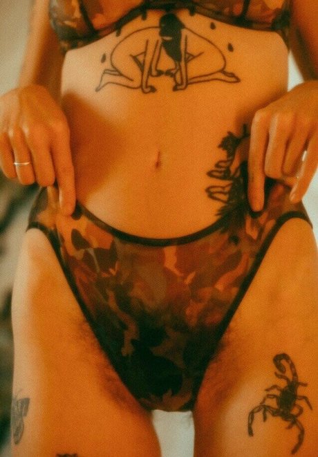 tattooed onlyfans free photo