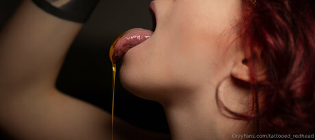Tattooed Redhead thumbnail