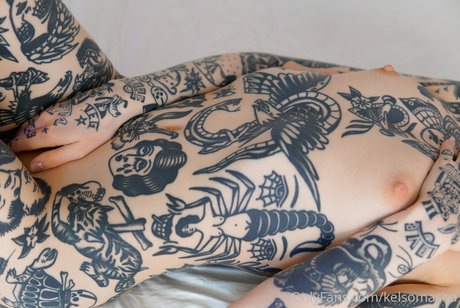 Tattooed Russian sex model photos