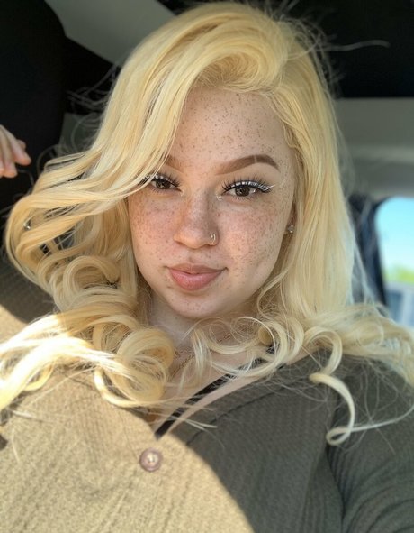 AHintOfRed pornstar nude archive