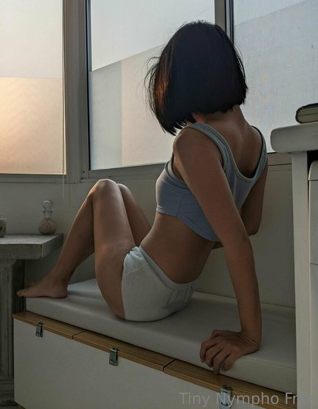 tiny nympho free model adult image