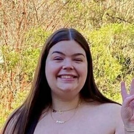 vollbusige brünette onlyfans top kunst foto